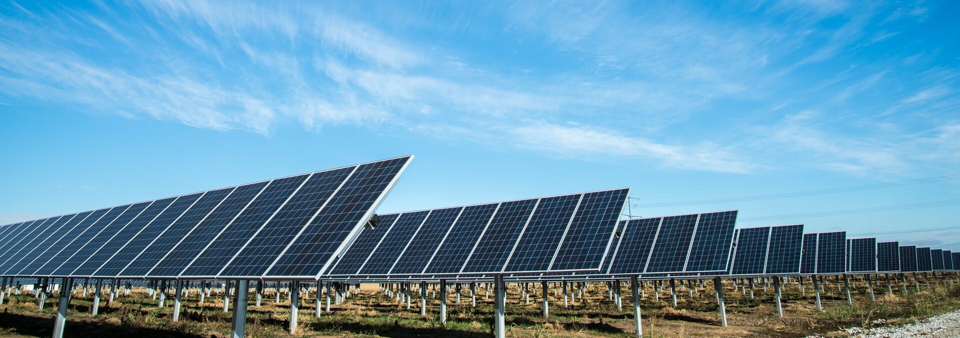 A solar farm of Jinko Solar photovoltaic PV panels